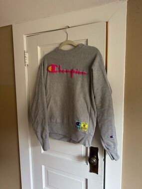 Champion Gray Sweatshirt with Pink and Yellow Logo